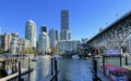 Bridge to greenville and water bus passing under the bridge Nature Canada Vancouver Pacific Ocean Pier and pillars on Royalty Free Stock Photo