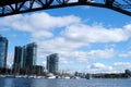 Bridge to greenville and water bus passing under the bridge Nature Canada Vancouver Pacific Ocean Pier and pillars on Royalty Free Stock Photo