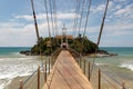 Bridge to Matara Parevi Duwa buddhist temple, perspective view