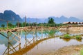 Bridge to riverside guesthouse