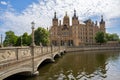 Bridge to the Schwerin Castle or Schwerin palace, in German Schweriner Schloss, a romantic landmark building on a lake in the