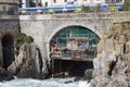 Bridge and train station in Riomaggiore in the National Park of Cinque Terre, Liguria, Italy Royalty Free Stock Photo