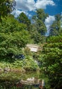 Bridge Through Trees in Garden Royalty Free Stock Photo