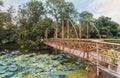 Bridge of Trust, serene pond is spanned by a beautiful bridge Royalty Free Stock Photo