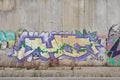 A bridge vandalized with street graffiti art