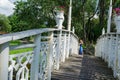 Bridge wiggle railings and girl resting at bridge