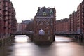 Bridges buildings and the river in Speicherstadt district in Hamburg, Germany Royalty Free Stock Photo