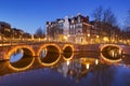 Bridges over canals in Amsterdam at night Royalty Free Stock Photo