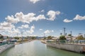 BRIDGETOWN, BARBADOS - MARCH 10, 2014: Cityscape with rive and local architecture in Bridgetown, Barbados. Caribbean Sea Island.