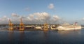 Bridgetown, Barbados - May 2, 2020: Panoramic shot of Carnival Valor docked in the port of Bridgetown. Beautiful blue sky, white