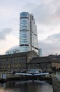 bridgewater place over the canal dock at granary wharf with converted office buildings and lock gates in leeds england