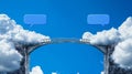 Bridging the Gap in Communication Stone bridge connecting two cloud mountains with blank speech bubbles above symbolizing Royalty Free Stock Photo