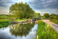 Bridgwater and Taunton Canal Somerset UK on calm still day in colourful HDR Royalty Free Stock Photo