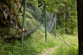 Bridle path, anti-rockfall mesh, in mountains