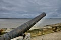 Old cannon by the harbour Royalty Free Stock Photo