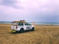 RNLI vehicle patrolling a beach