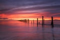 Bridport ruined Jetty at sunrise Royalty Free Stock Photo