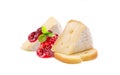 Brie cheese. Camembert cheese. Fresh cheese with cranberry jam on a piece of bread. Baguette crackers.