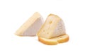 Brie cheese. Camembert cheese. Fresh Brie cheese on a piece of bread. Baguette crackers.