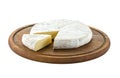 Brie cheese with cut sice on wooden board. With path.