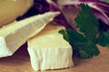 Brie cheese on cutting board close-up photo Royalty Free Stock Photo