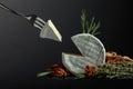 Brie cheese and fork with triangle piece Royalty Free Stock Photo