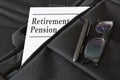 Briefcase containing some retirement pension documents and reports. Royalty Free Stock Photo