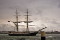 Brig on the river in heavy rain