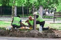 Brigade of road guest workers have lunch on the street during a break in Perm, Russia