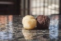 brigadeiro and beijinho, Brazilian sweets on a white plate, selective focus and copy space