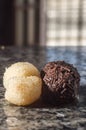 brigadeiro and beijinho, Brazilian sweets on a white plate, selective focus and copy space