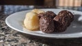 brigadeiro and beijinho, Brazilian sweets on a white plate, selective focus and copy space