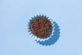 Brigadeiro is a chocolate truffle from Brazil. Cocoa and sprinkles of chocolate. Children birthday party sweet. Top view of candy