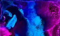 Bright abstract neon dark blue, pink and purple alcohol ink background. Liquid watercolor paint splash texture effect illustration