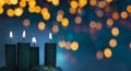 Advent candles at chiristmas holidays shining at night Royalty Free Stock Photo