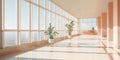 A bright, airy corridor with expansive windows overlooks the sea, accented with green plants and a soft peach palette