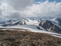 Bright atmospheric scenery on top of mountain ridge above clouds in thick low clouds. Beautiful landscape with mountain range with Royalty Free Stock Photo