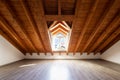 Bright attic with wooden beams and parquet