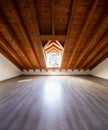 Bright attic with wooden beams and parquet