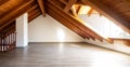 Bright attic with wooden beams and parquet Royalty Free Stock Photo