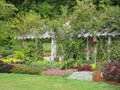 Bright attractive nature flower bed with arbor blooming in summer at Stanley Park Garden Royalty Free Stock Photo