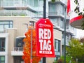 Bright attractive `Toyota Red Tag Days` sign posted by street 2020
