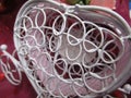 Bright attractive heart shape white carriage ornament decoration close up
