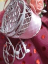 Bright attractive heart shape white carriage ornament decoration close up