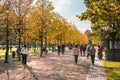 Bright autumn city landscape with walking people. District Of New Holland. September 30, 2020, Saint Petersburg, Russia