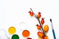 Bright autumn colors, paints, brushes and palette on white background, space or flat text layer. Concept back to school. Close-up