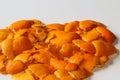 Bright background. Defocus blurred Christmas background from the peels of orange and tangerine on a white background Royalty Free Stock Photo