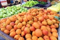Apricots, pears, peppers, plums are on the market counter for sale Royalty Free Stock Photo
