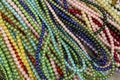 Bright background of handmade strands of colorful beads Royalty Free Stock Photo