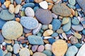 Bright Background Of Multi-colored Round Stones, Sea Pebbles, Close Up.